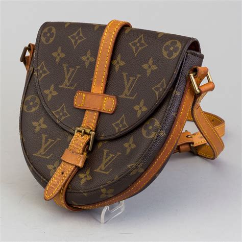 louis vuitton sholder bag women beige leather|Louis Vuitton embossed leather bag.